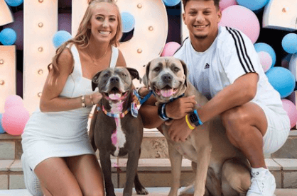 Patrick Mahomes and Brittany Matthews with their dogs
