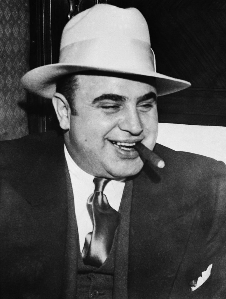 An image of Al Capone smoking a cigar