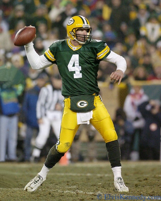 Brett Favre of the Green Bay Packers passes during a playoff game
