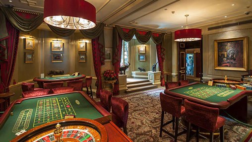 interior of Clermont Club shows gaming tables