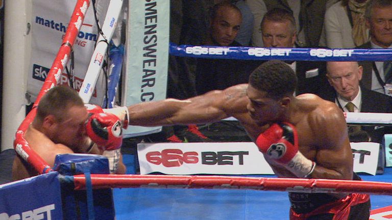 Anthony Joshua competing in his first world heavyweight title fight