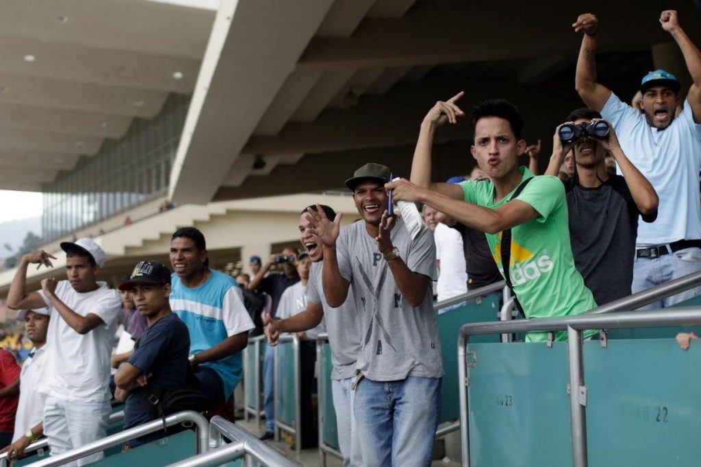Horse racing fans attending a race in Venezuela