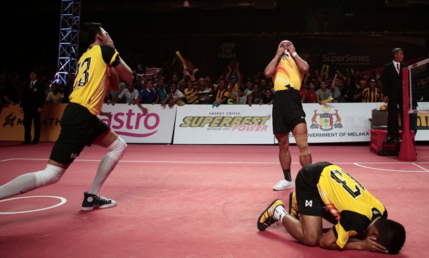 Players celebrating a victory in a major Sepak Takraw competition
