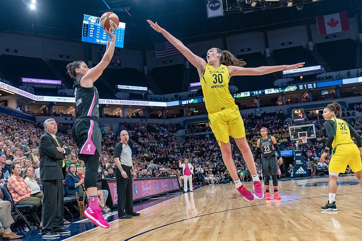 Minnesota Lynx player Cecilia Zandalasini attempts a 3 point shot