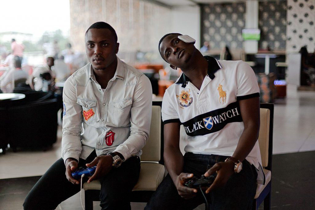 Two guys play console games in Nigeria