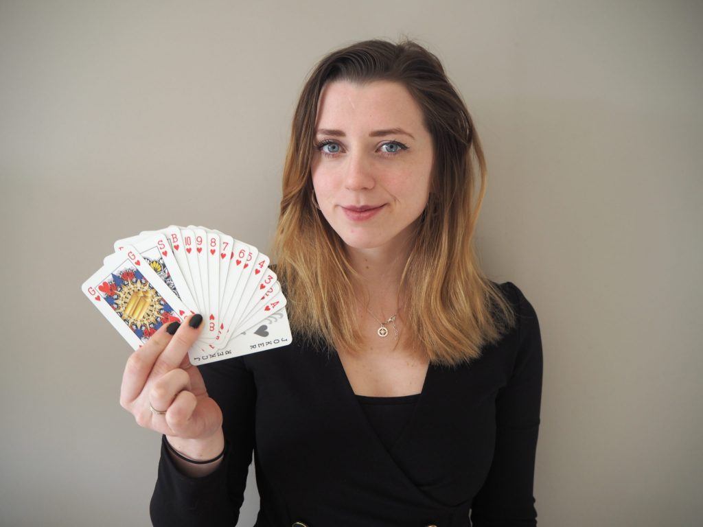 Indy Mellink holding her GSB cards