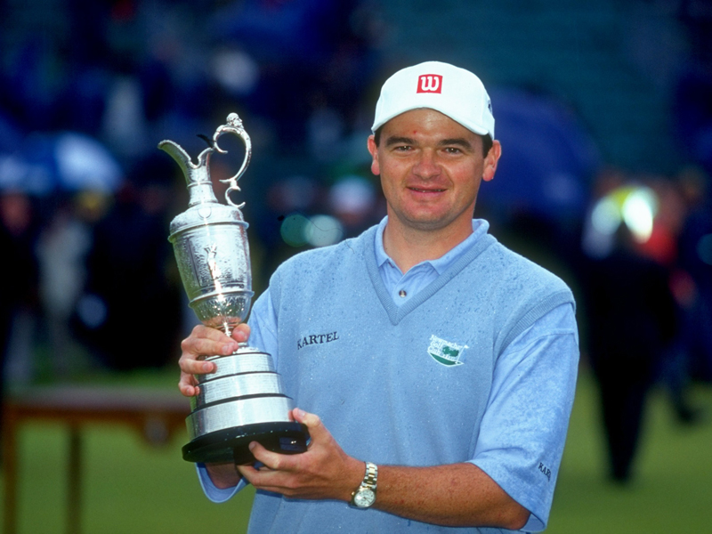 Scottish-born Paul Lawrie posing with The Open trophy