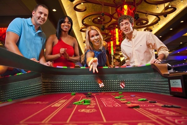 People playing craps at a casino