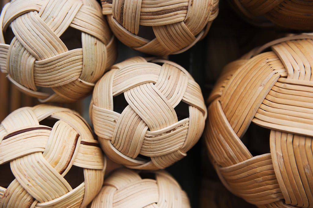 The woven ball used in this sport