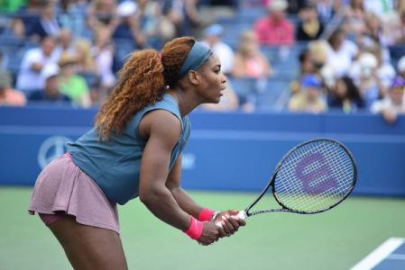 Serena Williams playing tennis.