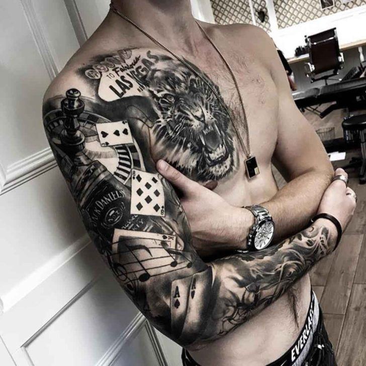 Chest and sleeve gambling tattoo and a roaring tiger