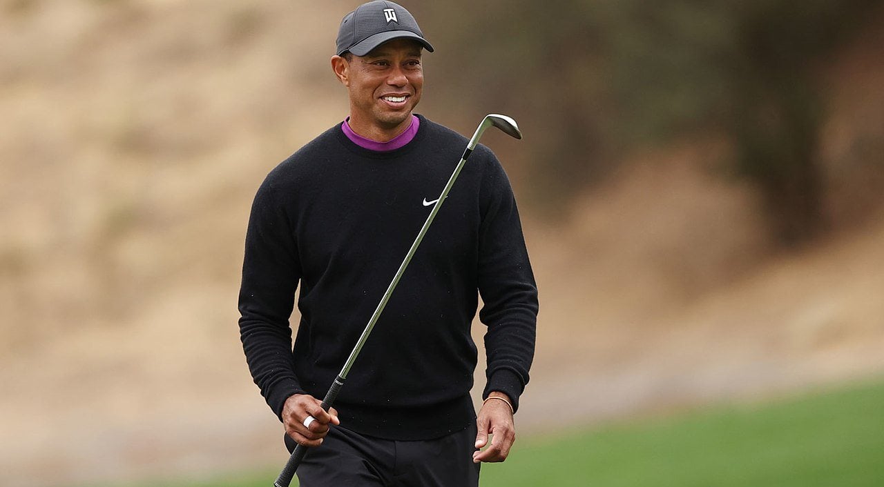 Tiger Woods holding a golf club