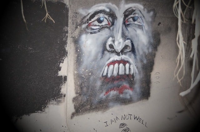 Art from a tunnel that shows the suffering from people living there