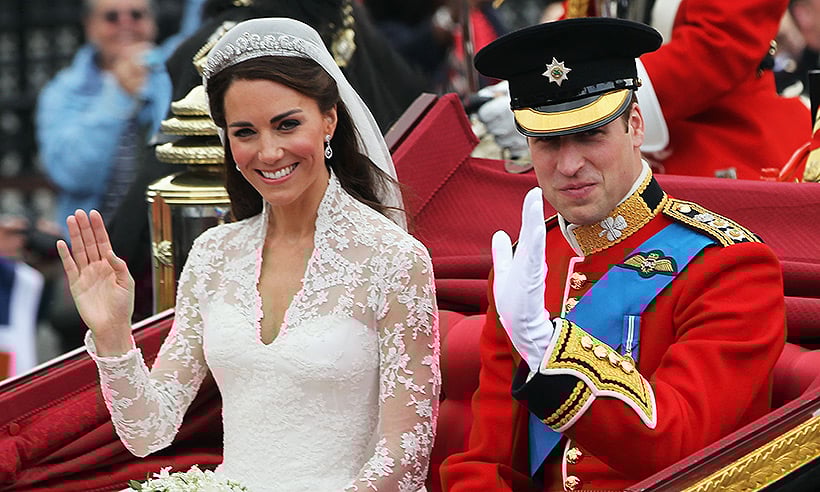 Prince William and Kate Middleton waving to the crowd