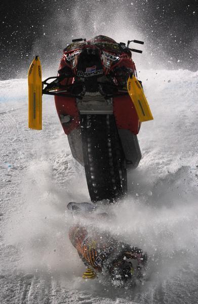 A photo of a snowmobile backflip fail from the Winter X Games