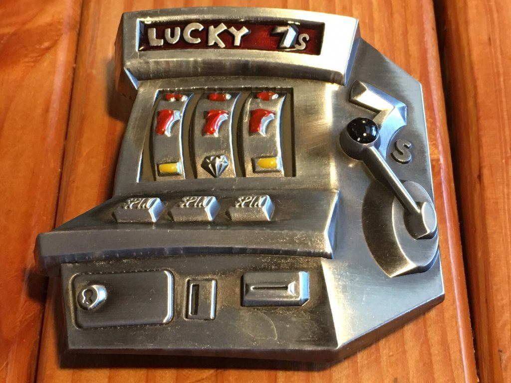 Slot machine belt buckle