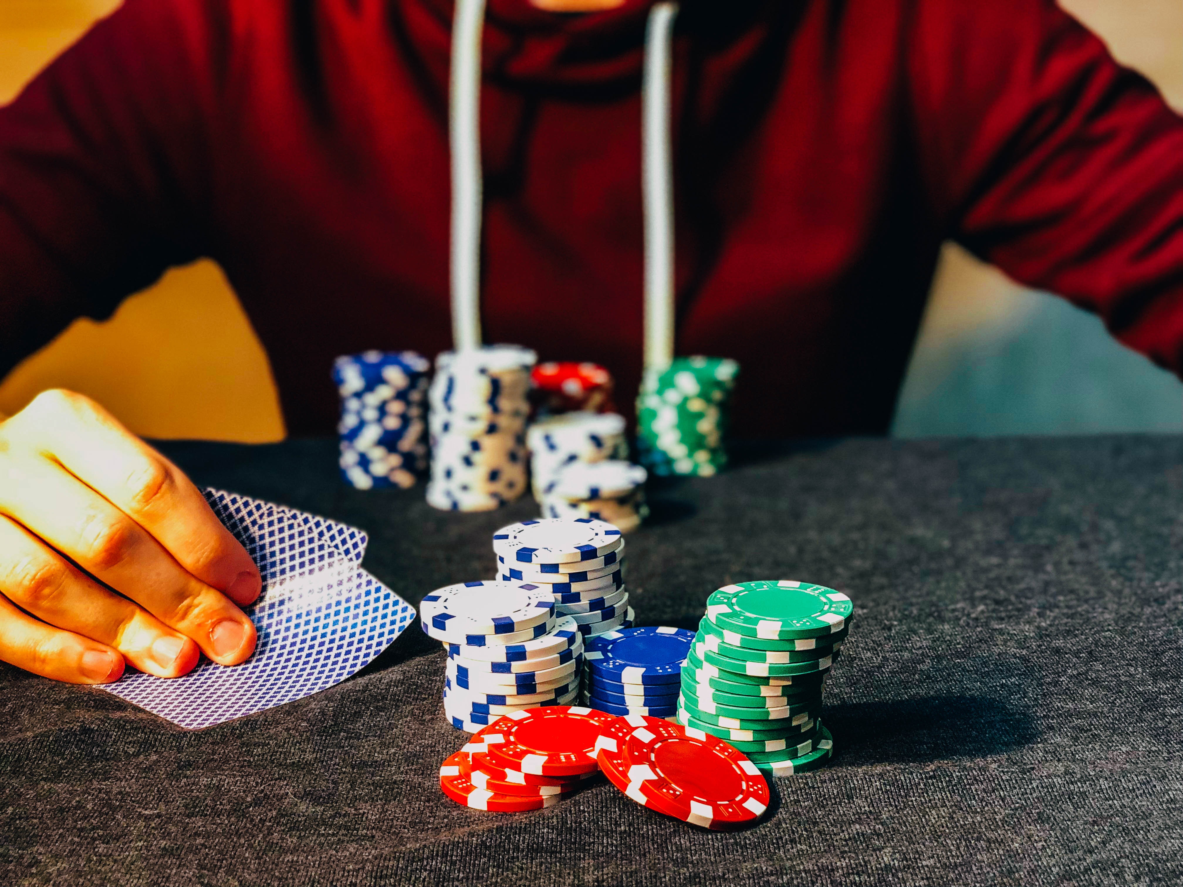 Man gambling with casino chips.