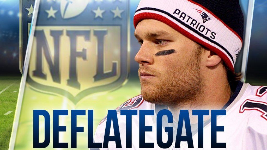Tom Brady with deflategate text