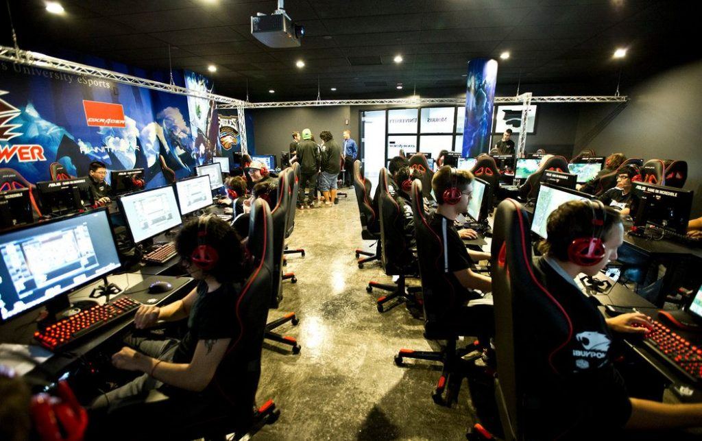 An image of eSports college students practicing at their favorite games