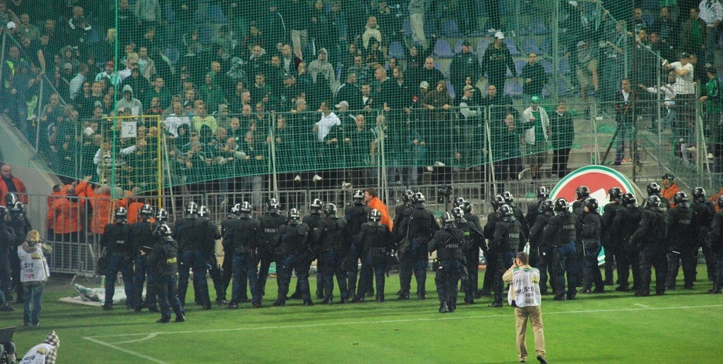 Ferencvaros fans being contained by riot police