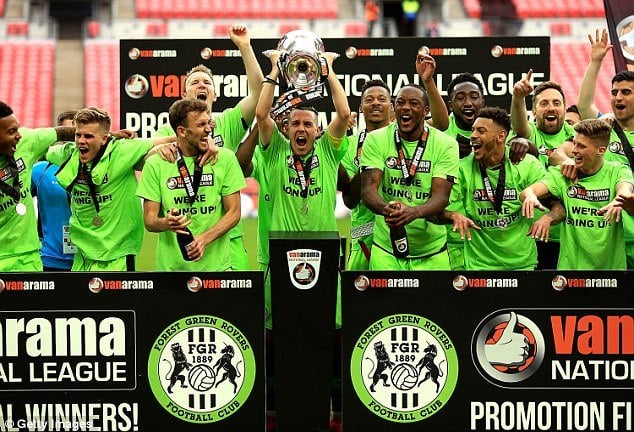 forest green rovers football team winning holding trophy 