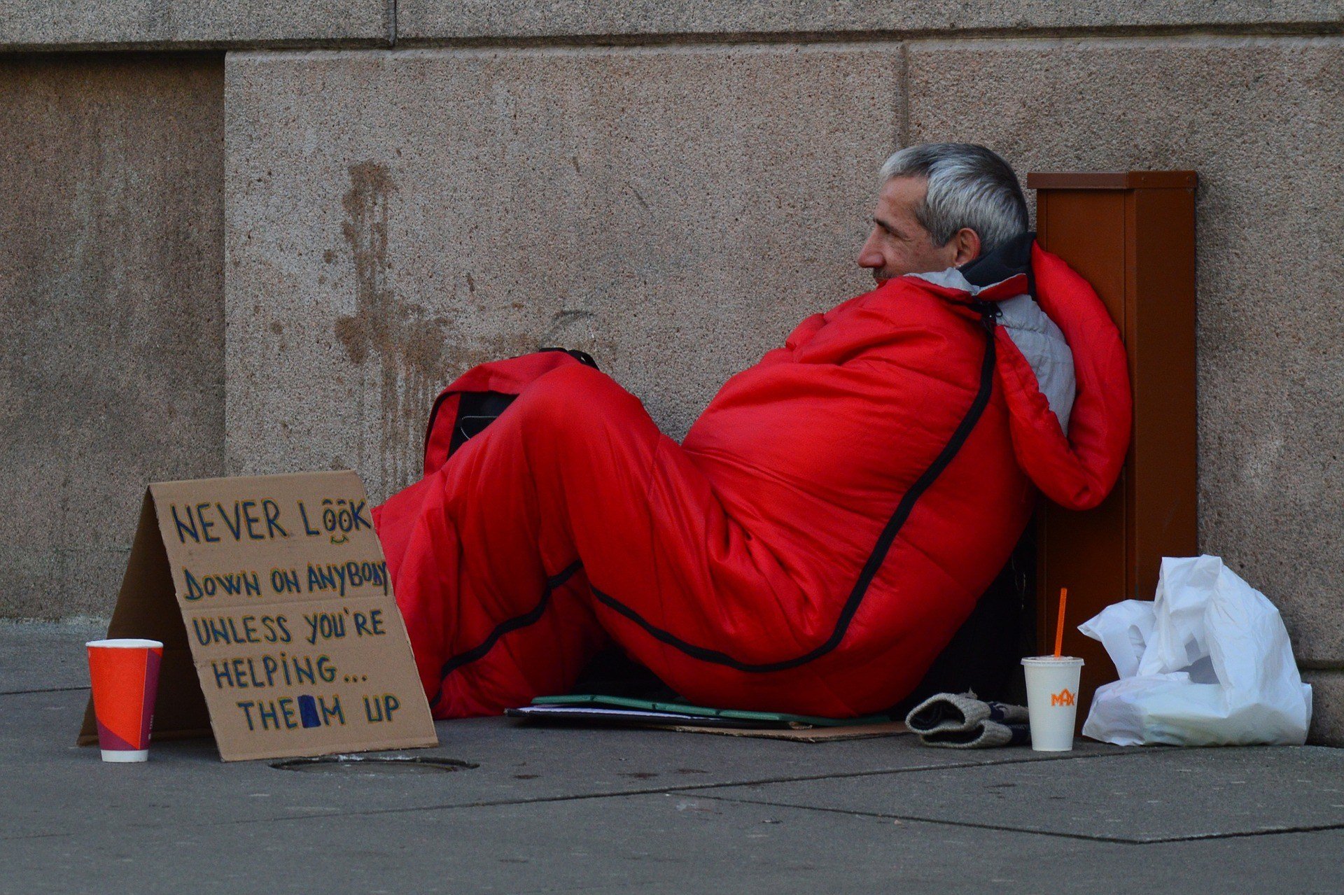 Homeless man in a sleeping bag.