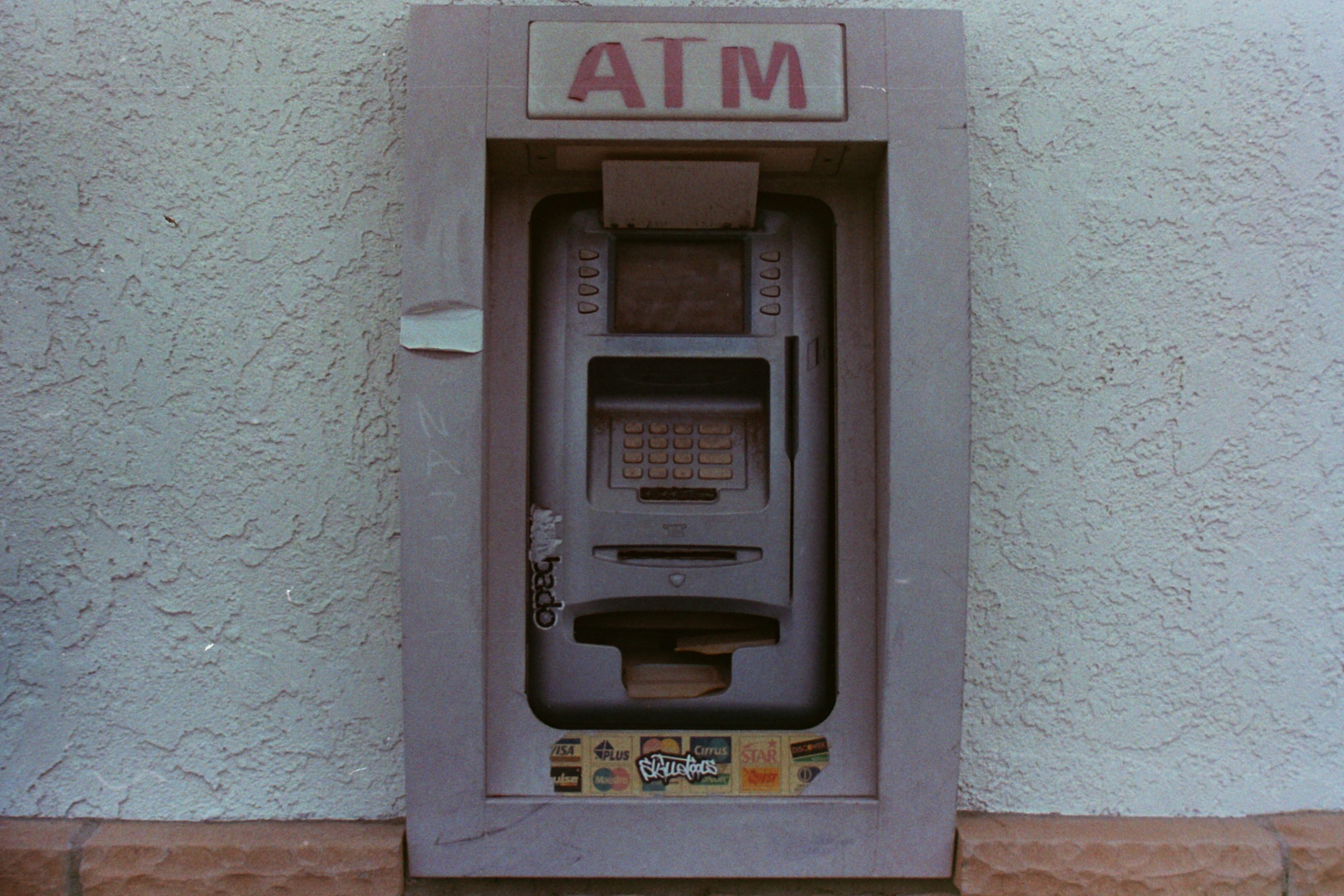 Grey ATM machine.