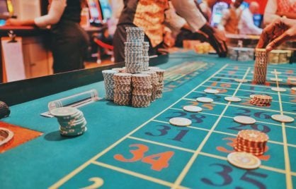 A casino table with a lot of chips on it