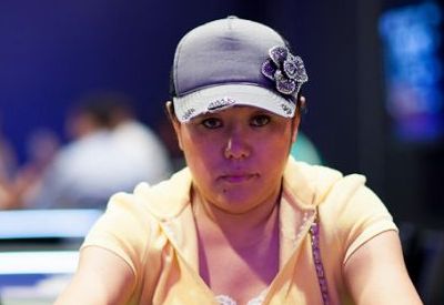 Kelly pictured in a grey cap at a live poker event
