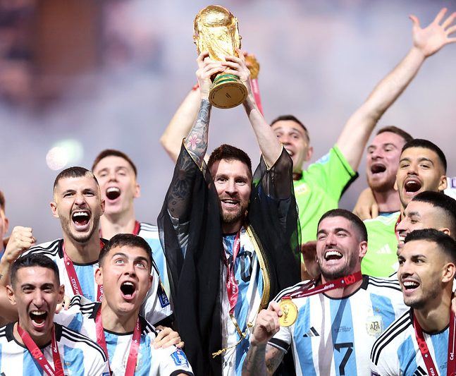 Lionel Messi raises the trophy