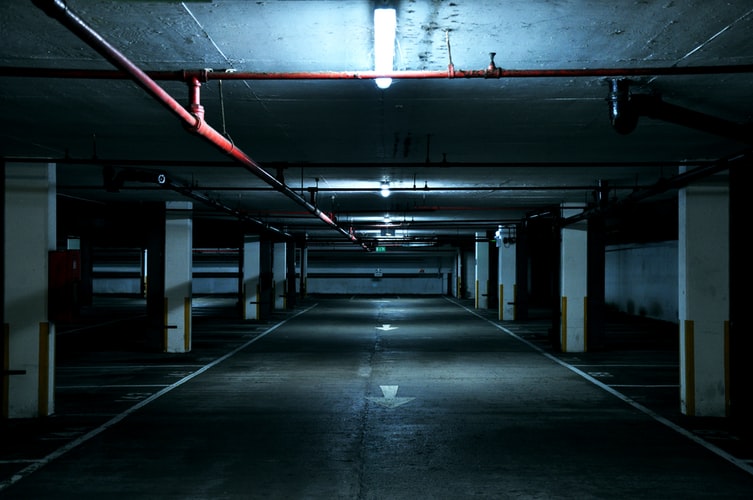 Dark industrial parking lot