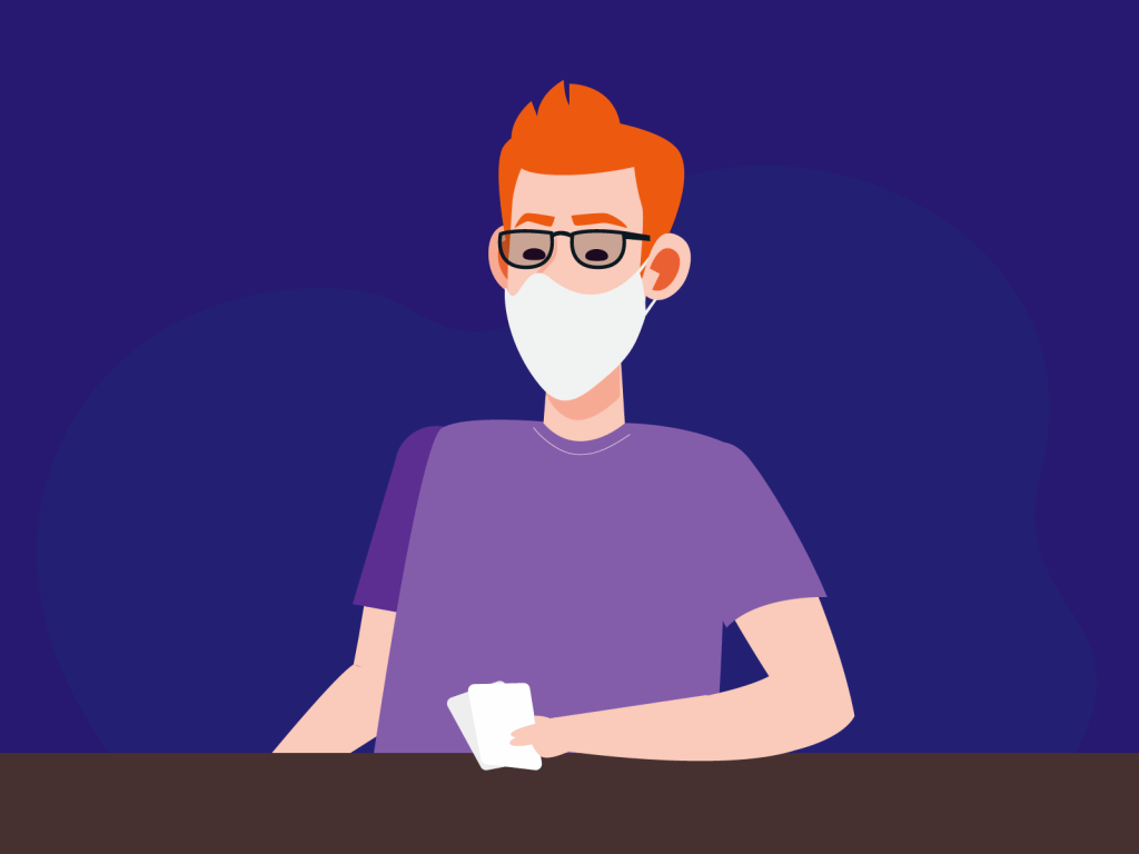 person playing poker with mask