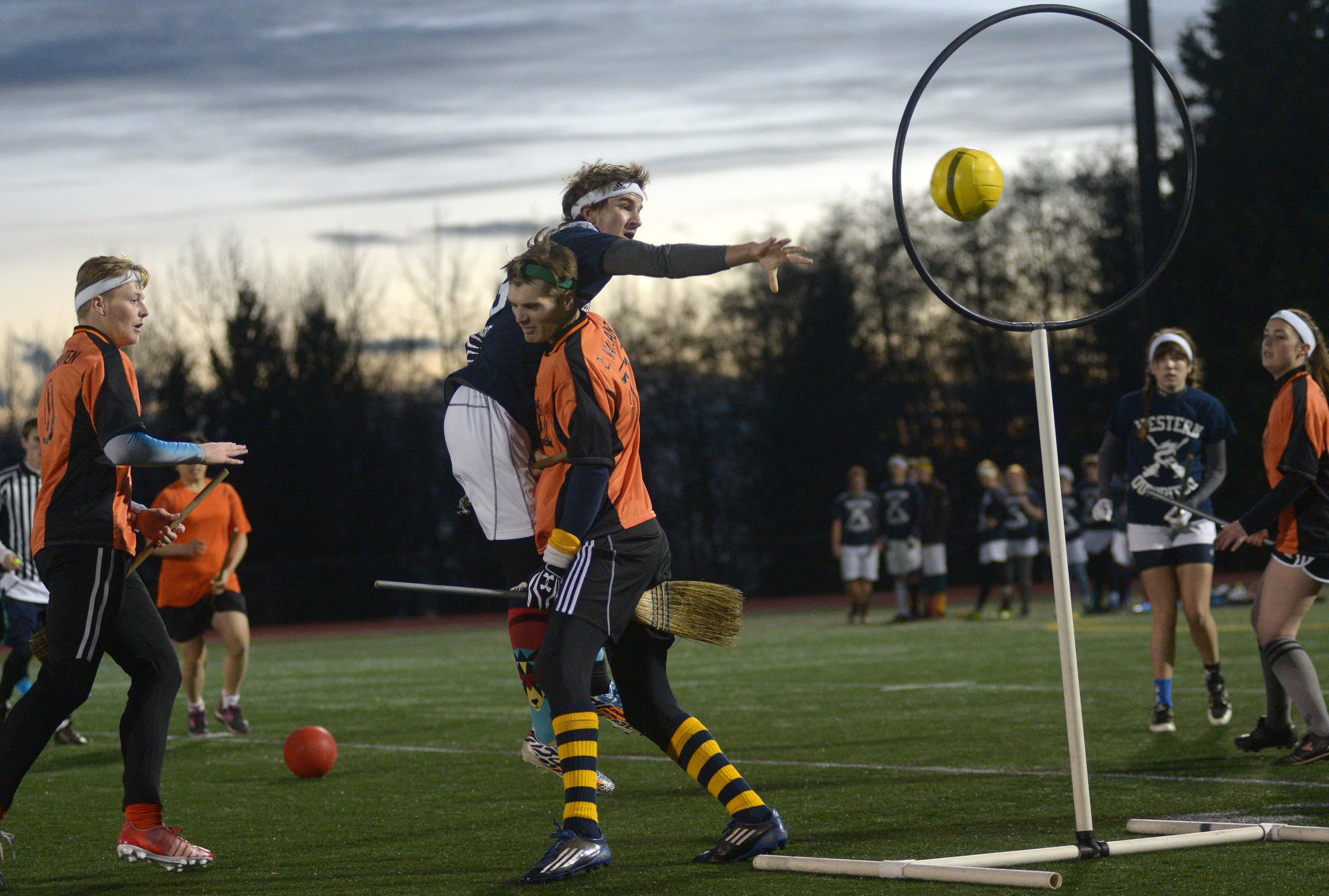 A chaser scoring points during a game of quidditch