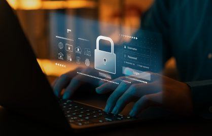 Shutterstock image depicting a digital lock and security symbols representing online gaming security and challenges with AI infiltration.