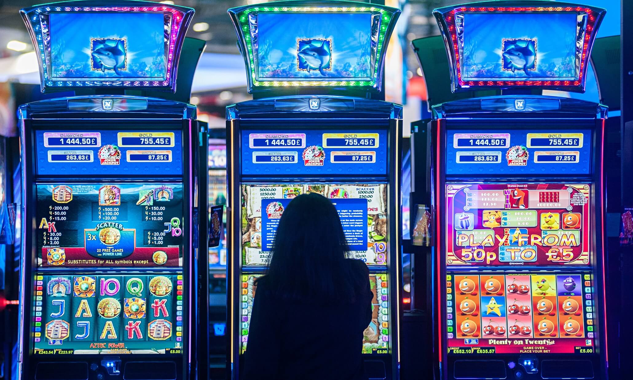 someone playing slot machines in a live casino