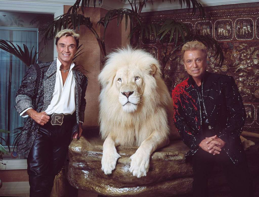 Siegfried und Roy und weisser Loewe