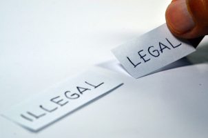 Illegal-, Legal-Schilder