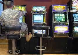 Gambling, military, slot machines. 