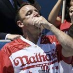 Joey Chestnut, Miki Sudo Defend Nathan’s Hot Dog Eating Contest Titles, Combined Scarf Down 102 Dogs