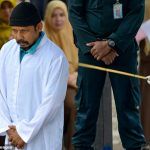 Indonesian Men Flogged for Alleged Gambling as Crowd Snaps Photos