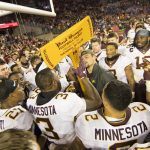 College Football Week 14 Odds: Wisconsin Favored in Showdown for Paul Bunyan’s Axe