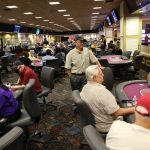 Las Vegas Poker Players, Frequently Unmasked, Gradually Return to Tables