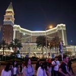 Las Vegas Sands, Wynn Pop as China Will Restart Some Macau Visa Issuance