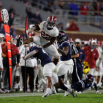 College Football Saturday: Alabama Coach Saban Looks to Beat COVID and Georgia
