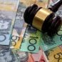 Judge's gavel on Australian dollars