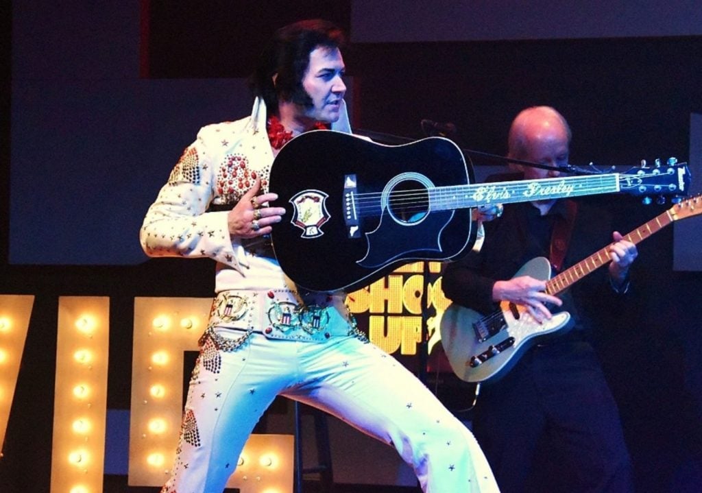Travis Allen performs as Elvis Presley