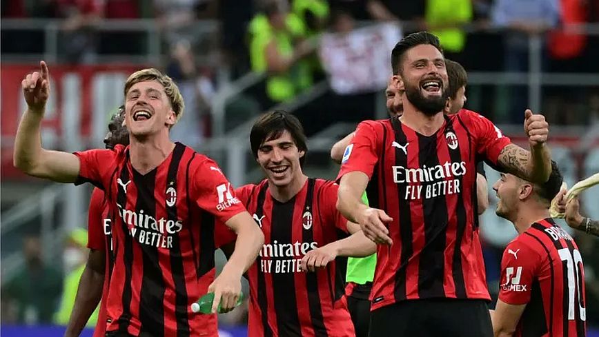 AC Milan players celebrate a win over Atalanta in May