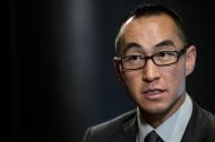 Melco Mulls Macau Headquarters in Bid to Keep Nasdaq Listing