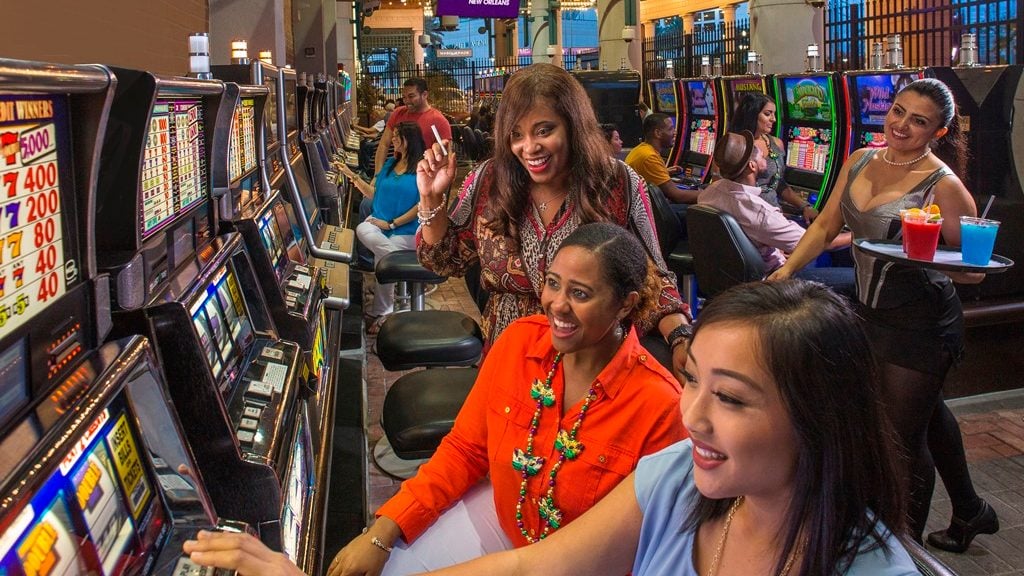 A promotional photo showing one of the semi-outdoor gaming patios at Harrah’s New Orleans. 