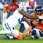 Russell Wilson lat shoulder injury Denverr Broncos QB Colts Chargers Russ